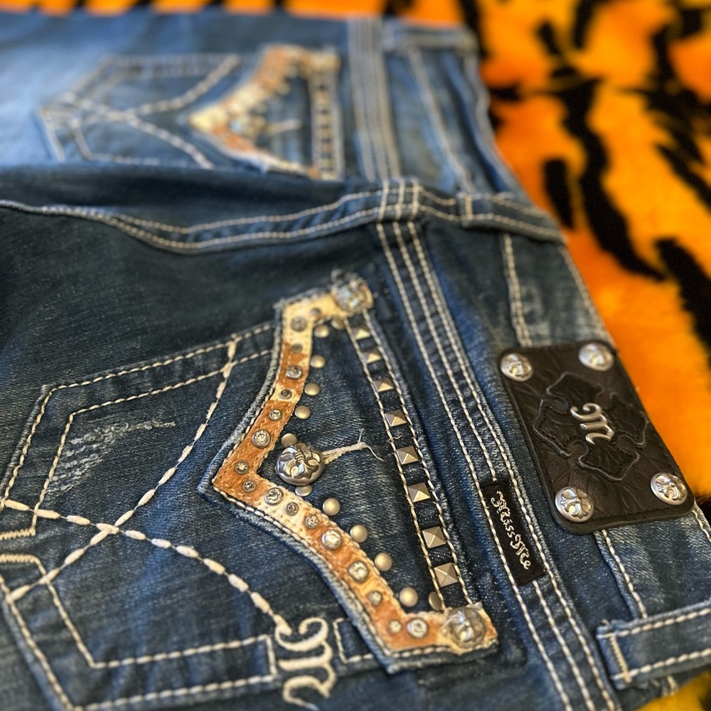 Miss Me rhinestone w/ fur bootcut jeans!